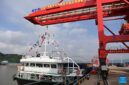 A cargo vessel prepares to depart for Yangpu Port in south China's Hainan Province along the Pinglu Canal at an operation area in Nanning Port, south China's Guangxi Zhuang Autonomous Region, Sept. 16, 2026. China opened a major new canal on Wednesday, giving its landlocked southwest a shortcut to the coast and overseas markets, particularly those in the Association of Southeast Asian Nations (ASEAN), the country's largest trading partner. Built at a cost of 72.7 billion yuan (about 10.75 billion U.S. dollars), the 134.2-kilometer Pinglu Canal runs from Nanning, capital of south China's Guangxi Zhuang Autonomous Region, to the Beibu Gulf, the closest maritime outlet for much of southwest China. (Xinhua/Cao Yiming)